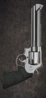 Silver revolver against dark textured background wallpaper.