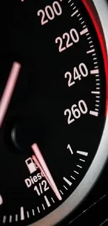 Sleek speedometer with red accents for car enthusiasts.