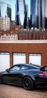 Black sports car with city skyscrapers in the background.