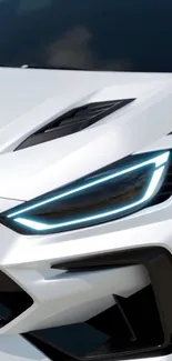 Close-up of a sleek sports car with LED headlights.