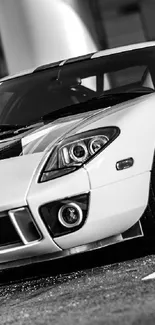 Black and white sports car wallpaper for mobile with sleek design and style.