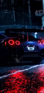 Sports car at night with red lights and rain reflecting on the street.