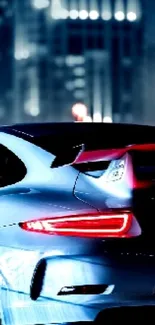 Sleek sports car with glowing lights in an urban night setting.