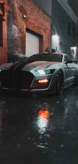 Dark sports car in wet urban alley.