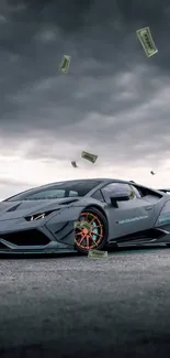 Sleek sports car under a cloudy sky.