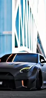 Sleek black Nissan sports car in urban setting with modern architecture.