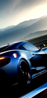 Sleek dark blue sports car on a scenic racing track.