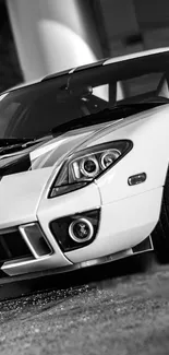 Black and white sports car wallpaper for mobile phone screen.