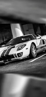 Sleek black and white sports car parked