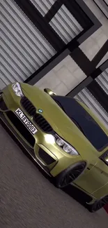 Olive green sports car parked in a modern garage.