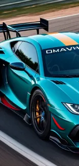 Sleek teal sports car on a racetrack.