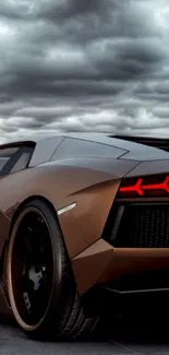 Brown luxury sports car under dramatic cloudy sky.