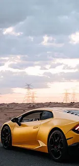 Yellow sports car on desert road at sunset with dynamic sky backdrop.