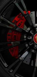 Close-up of a stylish sports car wheel with a vibrant red brake design.