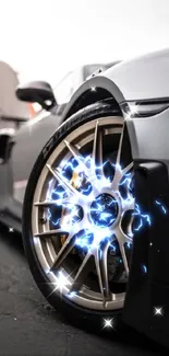 Close-up view of a sleek sports car wheel showing intricate design.