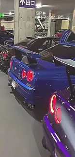 Lineup of sleek sports cars in an urban garage.