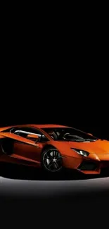 Orange sports car on black background, wallpaper.