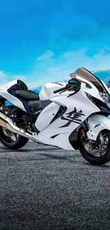 2023 Suzuki Hayabusa on a scenic road with sky backdrop.