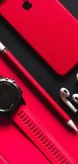 Red-themed tech gadgets wallpaper featuring phone, watch, and accessories.