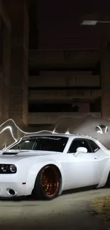 Sleek white sports car in urban setting at night.