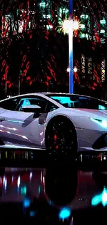 White sports car with neon lights at night.