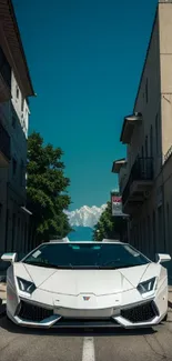 Sleek white sports car in urban setting wallpaper.