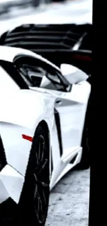 Sleek white sports car on snowy road