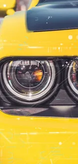 Close-up of a sleek yellow car headlight design.