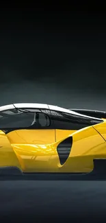 Sleek yellow car with futuristic design on a dark background.