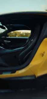 Yellow sports car interior with sleek design.