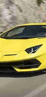 Yellow sports car on scenic road