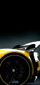 Sleek yellow sports car against dark background.