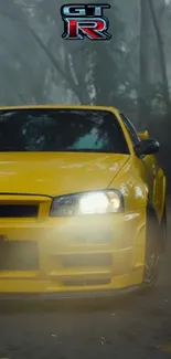 Vibrant yellow sports car in motion on a misty road.