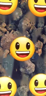 Smiley emojis on a rock background mobile wallpaper.