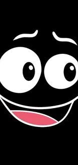 Smiley cartoon face on a black background wallpaper.