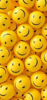 A collection of yellow smiley faces on a mobile wallpaper.