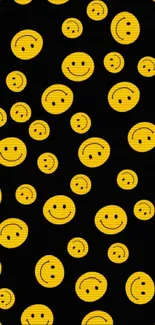 Mobile wallpaper with yellow smiley faces on black background.