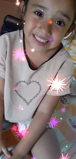 Smiling child with colorful star effects on wallpaper.