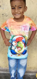 Happy child in vibrant Ganesh shirt