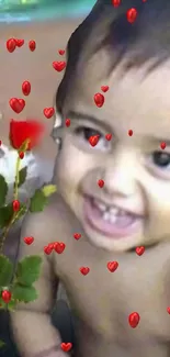 Smiling child with red hearts and a rose.