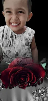 Smiling child with red rose on artistic dark background wallpaper.