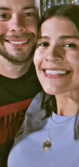 Smiling couple close-up portrait wallpaper.