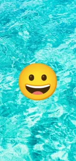 Smiling emoji on vibrant blue water background.