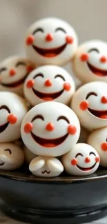Mobile wallpaper with cute, smiling face balls in a playful arrangement.