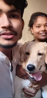 Two friends smiling with a dog.