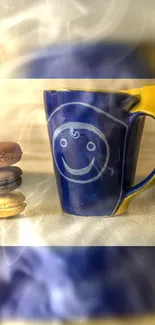 Colorful mug with a smiley face and macarons in a cozy setting.