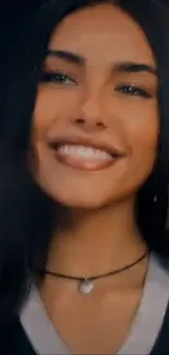 Smiling woman with dark hair mobile wallpaper.