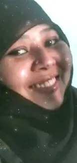 Woman in black hijab smiles with sparkling effect background.