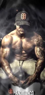 Muscular man with tattoos sitting in a smoky gym setting.