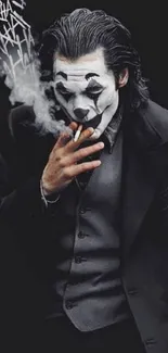 Joker character in dark suit smoking with white face paint.